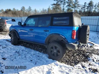 2023 Ford Bronco with VIN 1FMDE5BH0PLB15673, listed as a Copart auction lot 87823915 with 24,749 mi miles and Salvage Title. Bid and sale history available at DreamBid. Image 2.