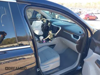 2021 GMC Acadia SLE with VIN 1GKKNKLA9MZ136112, listed as a IAAI auction lot 41212337 with 76,827 mi miles and . Bid and sale history available at DreamBid. Image 5.
