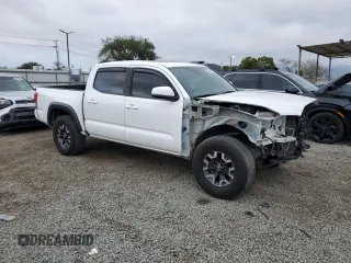 2018 Toyota Tacoma SR z VIN 3TMCZ5AN5JM181489, wystawiony jako Copart lot #55696365 z przebiegiem 70 091 mil mil oraz Szkoda całkowita • Salvage title. Historia ofert i sprzedaży dostępna na DreamBid. Obrazek 4.