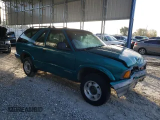 1995 GMC Jimmy SLS Base with VIN 1GKCS18WXS2519056, listed as a Copart auction lot 79313514 with 161,002 mi miles and Salvage Title. Bid and sale history available at carsss.com. Image 4.