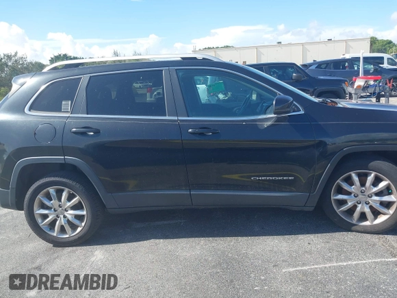 2014 Jeep Cherokee Limited with VIN 1C4PJLDS9EW217074, listed as a IAAI auction lot 42705468 with 144,007 mi miles and . Bid and sale history available at DreamBid. Image 13.