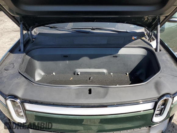 2023 Rivian R1T Adventure z VIN 7FCTGAAA9PN018171, wystawiony jako Copart lot #72593614 z przebiegiem 12 553 mil mil oraz Szkody całkowita. Historia ofert i sprzedaży dostępna na DreamBid. Obrazek 11.
