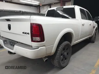 2017 Ram 2500 Laramie with VIN 3C6UR5FL1HG726325, listed as a IAAI auction lot 42315570 with 104,038 mi miles and . Bid and sale history available at DreamBid. Image 4.