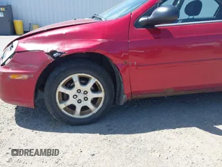 2005 Dodge Neon SXT with VIN 1B3ES56C95D266052, listed as a IAAI auction lot 42154635 with 130,744 mi miles and . Bid and sale history available at carsss.com. Image 17.
