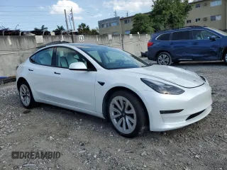 2023 Tesla Model 3 z VIN 5YJ3E1EAXPF422956, wystawiony jako Copart lot #52500285 z przebiegiem 24 082 mil mil oraz Nie do naprawy • Non repairable. Historia ofert i sprzedaży dostępna na DreamBid. Obrazek 4.