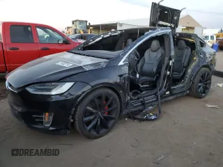 2016 Tesla Model X P90D with VIN 5YJXCDE41GF026630, listed as a Copart auction lot 71643714 with 0 mi miles and Salvage Title. Bid and sale history available at carsss.com. Image 1.