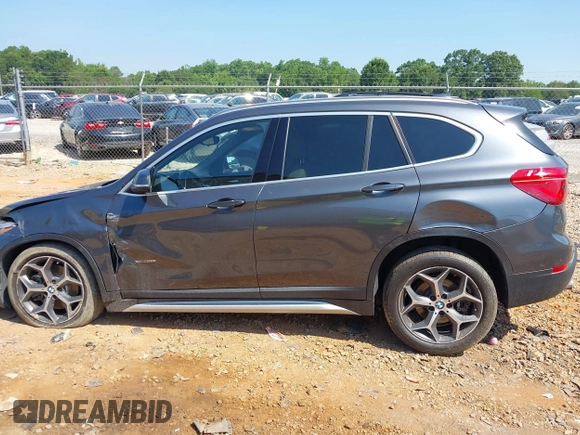 2016 BMW X1 xDrive28i with VIN WBXHT3C31G5E47828, listed as a IAAI auction lot 42592338 with 91,927 mi miles and . Bid and sale history available at DreamBid. Image 14.