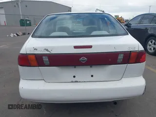 1996 Nissan Sentra XE z VIN 3N1AB41D2TL013267, wystawiony jako IAAI lot #41505728 z przebiegiem 232 387 mil mil oraz . Historia ofert i sprzedaży dostępna na DreamBid. Obrazek 16.