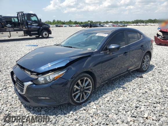 2018 Mazda 3 Touring z VIN 3MZBN1V30JM243211, wystawiony jako Copart lot #58324975 z przebiegiem 86 030 mil mil oraz Szkoda całkowita • Salvage title. Historia ofert i sprzedaży dostępna na DreamBid. Obrazek 1.