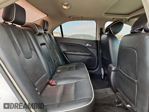 2012 Ford Fusion SEL with VIN 3FAHP0JG0CR395673, listed as a Copart auction lot 57904135 with 169,886 mi miles and Salvage title. Bid and sale history available at DreamBid. Image 10.