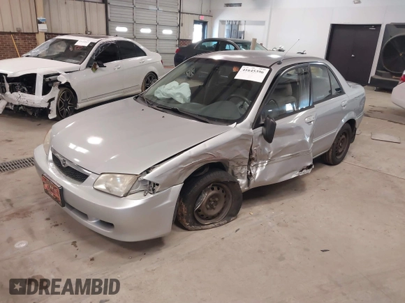 2000 Mazda Protege DX with VIN JM1BJ2226Y0206340, listed as a IAAI auction lot 41645396 with 238,500 mi miles and . Bid and sale history available at DreamBid. Image 17.