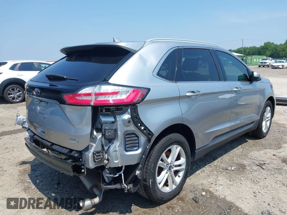 2020 Ford Edge SEL with VIN 2FMPK3J98LBA83828, listed as a IAAI auction lot 42585669 with 60,704 mi miles and . Bid and sale history available at DreamBid. Image 4.
