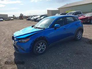 2016 Mazda CX-3 Sport z VIN JM1DKFB73G0140286, wystawiony jako IAAI lot #42235327 z przebiegiem 83 430 mil mil oraz . Historia ofert i sprzedaży dostępna na DreamBid. Obrazek 2.