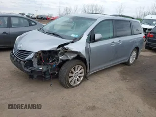 2012 Toyota Sienna LE with VIN 5TDJK3DC0CS046420, listed as a IAAI auction lot 41626308 with 108,517 mi miles. Bid and sale history available at carsss.com. Image 2.