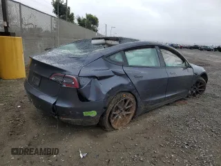 2023 Tesla Model 3 with VIN 5YJ3E1EA2PF434910, listed as a Copart auction lot 48523135 with 0 mi miles and Non Repairable. Bid and sale history available at carsss.com. Image 3.