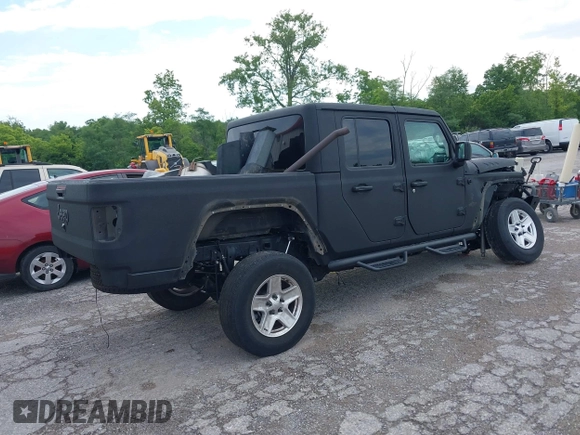 2021 Jeep Gladiator Sport S z VIN 1C6JJTAG9ML604950, wystawiony jako IAAI lot #39912720 z przebiegiem 34 640 mil mil oraz . Historia ofert i sprzedaży dostępna na DreamBid. Obrazek 4.