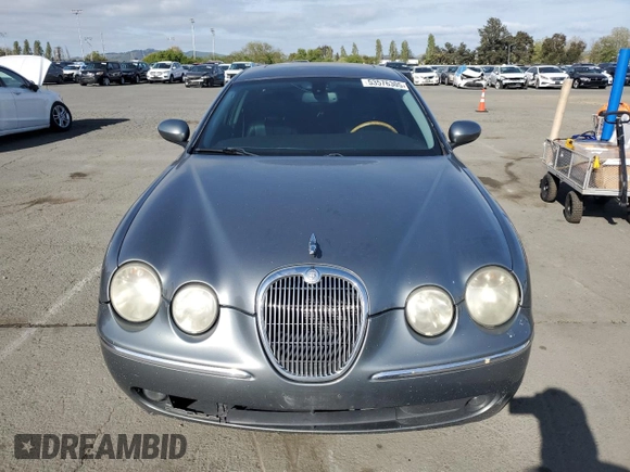 2005 Jaguar S-Type with VIN SAJWA01T15FN13800, listed as a Copart auction lot 53576305 with 182,533 mi miles and Salvage Title. Bid and sale history available at DreamBid. Image 5.