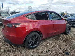2024 Tesla Model Y Long Range z VIN 7SAYGDEE8RA302077, wystawiony jako Copart lot #52622465 z przebiegiem 11 830 mil mil oraz Szkoda całkowita • Salvage title. Historia ofert i sprzedaży dostępna na DreamBid. Obrazek 3.