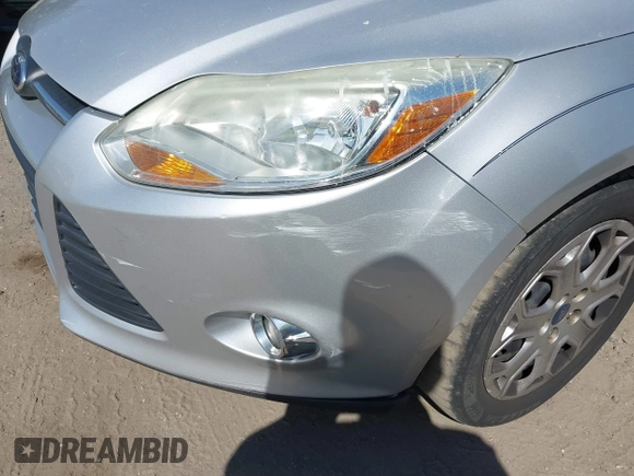 2012 Ford Focus SE with VIN 1FAHP3F29CL377721, listed as a IAAI auction lot 41848786 with 147,709 mi miles. Bid and sale history available at carsss.com. Image 6.