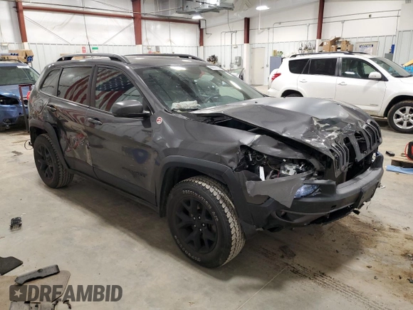 2018 Jeep Cherokee Trailhawk with VIN 1C4PJMBB8JD599791, listed as a Copart auction lot 86650054 with 66,360 mi miles and Non Repairable. Bid and sale history available at DreamBid. Image 4.