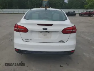 2015 Ford Focus SE with VIN 1FADP3F21FL246821, listed as a Copart auction lot 59732635 with 135,752 mi miles and Salvage title. Bid and sale history available at DreamBid. Image 6.