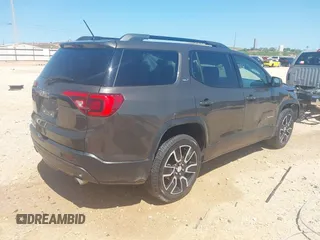 2019 GMC Acadia SLT with VIN 1GKKNMLSXKZ154992, listed as a IAAI auction lot 42452959 with 56,785 mi miles and . Bid and sale history available at DreamBid. Image 4.
