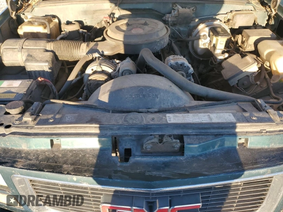 1995 GMC Sierra 1500 z VIN 2GTEK19K6S1580355, wystawiony jako Copart lot #87416254 z przebiegiem 162 829 mil mil oraz Szkody całkowita. Historia ofert i sprzedaży dostępna na DreamBid. Obrazek 13.