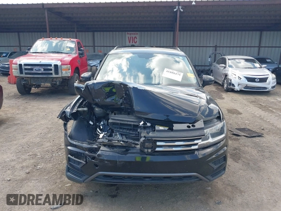 2021 Volkswagen Tiguan SE with VIN 3VV3B7AX3MM157702, listed as a IAAI auction lot 41888479 with 51,807 mi miles and . Bid and sale history available at DreamBid. Image 11.