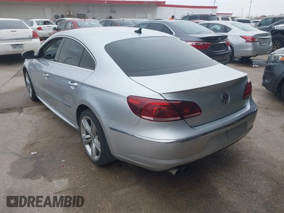 2014 Volkswagen CC Sport with VIN WVWBN7ANXEE501758, listed as a IAAI auction lot 41443518 with 193,259 mi miles and . Bid and sale history available at DreamBid. Image 3.