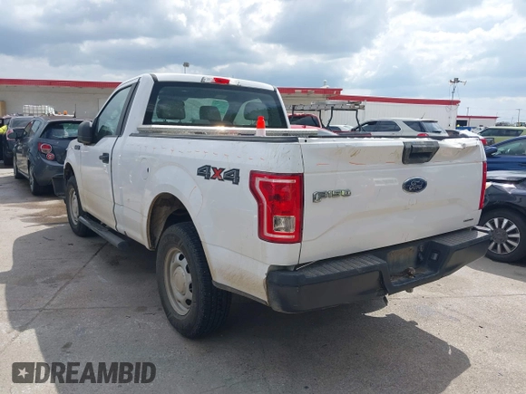 2015 Ford F-150 XL with VIN 1FTMF1E84FKD12758, listed as a IAAI auction lot 41841584 with 59,950 mi miles and . Bid and sale history available at DreamBid. Image 3.