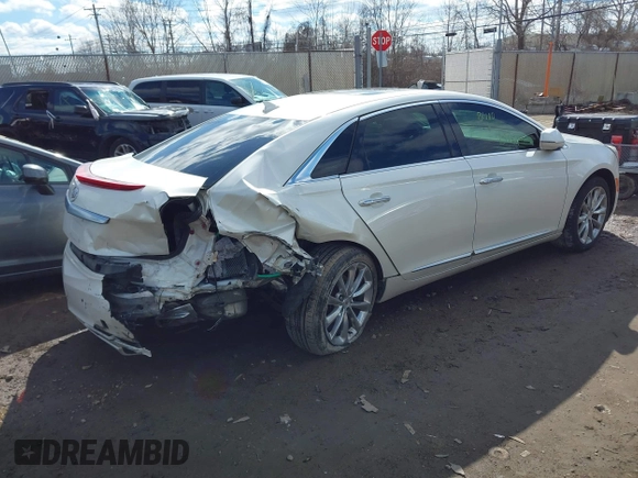 2014 Cadillac XTS Premium with VIN 2G61P5S38E9124277, listed as a IAAI auction lot 41744734 with 136,223 mi miles. Bid and sale history available at carsss.com. Image 4.