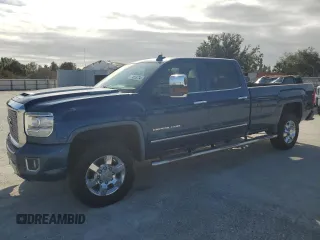 2017 GMC Sierra 3500HD Denali z VIN 1GT42YEY6HF158831, wystawiony jako Copart lot #74659734 z przebiegiem Nie podano mil oraz Nie do naprawy • Non repairable. Historia ofert i sprzedaży dostępna na DreamBid. Obrazek 1.