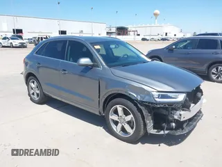 2015 Audi Q3 Prestige with VIN WA1GFCFS7FR013818, listed as a IAAI auction lot 41975076 with 60,295 mi miles and . Bid and sale history available at DreamBid. Image 1.