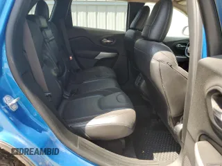 2018 Jeep Cherokee Trailhawk z VIN 1C4PJMBX0JD562021, wystawiony jako Copart lot #59136885 z przebiegiem 122 792 mil mil oraz Szkoda całkowita • Salvage title. Historia ofert i sprzedaży dostępna na DreamBid. Obrazek 11.