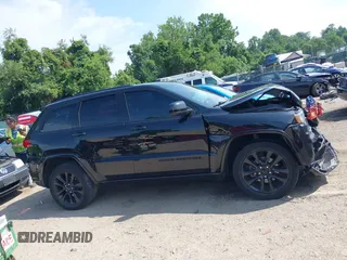 2018 Jeep Grand Cherokee Upland with VIN 1C4RJFAG2JC350975, listed as a IAAI auction lot 42612836 with 148,435 mi miles and . Bid and sale history available at DreamBid. Image 13.