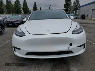 2022 Tesla Model Y Long Range z VIN 7SAYGDEE5NF352075, wystawiony jako Copart lot #50799895 z przebiegiem 11 597 mil mil oraz Szkoda całkowita • Salvage title. Historia ofert i sprzedaży dostępna na DreamBid. Obrazek 5.