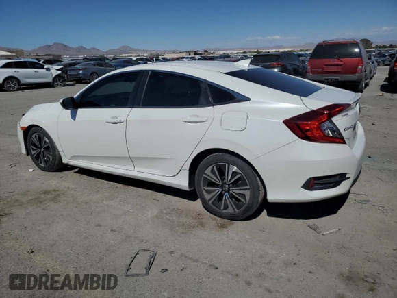 2016 Honda Civic EX-T z VIN 19XFC1F35GE029827, wystawiony jako Copart lot #55698325 z przebiegiem 108 297 mil mil oraz Szkoda całkowita • Salvage title. Historia ofert i sprzedaży dostępna na DreamBid. Obrazek 2.