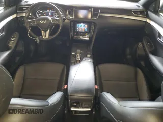2021 Infiniti QX50 Luxe with VIN 3PCAJ5BBXMF104676, listed as a Copart auction lot 55590605 with 37,896 mi miles and Salvage title. Bid and sale history available at DreamBid. Image 8.