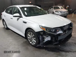 2018 Kia Optima LX z VIN 5XXGT4L34JG252028, wystawiony jako IAAI lot #41979909 z przebiegiem 90 113 mil mil oraz . Historia ofert i sprzedaży dostępna na DreamBid. Obrazek 1.