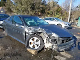 2005 Pontiac Grand Prix z VIN 2G2WP522951195596, wystawiony jako IAAI lot #41398363 z przebiegiem 230 977 mil mil oraz . Historia ofert i sprzedaży dostępna na DreamBid. Obrazek 1.