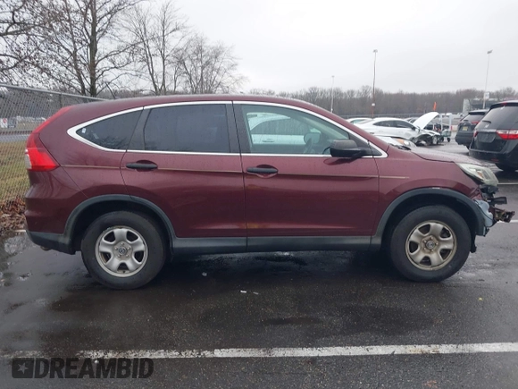 2015 Honda CR-V LX with VIN 2HKRM4H37FH695347, listed as a IAAI auction lot 41124018 with 117,400 mi miles and . Bid and sale history available at DreamBid. Image 14.