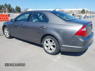 2012 Ford Fusion SE z VIN 3FAHP0HA8CR401382, wystawiony jako IAAI lot #41739680 z przebiegiem 73 404 mil mil oraz . Historia ofert i sprzedaży dostępna na DreamBid. Obrazek 3.