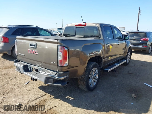 2015 GMC Canyon 2WD SLT with VIN 1GTG5CE33F1217775, listed as a IAAI auction lot 41485677 with 1 mi miles. Bid and sale history available at carsss.com. Image 4.