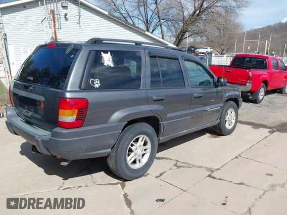 2003 Jeep Grand Cherokee Laredo with VIN 1J4GX48S53C504225, listed as a IAAI auction lot 41879669 with 247,246 mi miles. Bid and sale history available at carsss.com. Image 4.