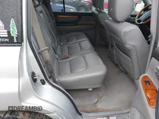 2006 Lexus LX 470 z VIN JTJHT00W364011426, wystawiony jako IAAI lot #42026869 z przebiegiem 254 659 mil mil oraz . Historia ofert i sprzedaży dostępna na DreamBid. Obrazek 8.