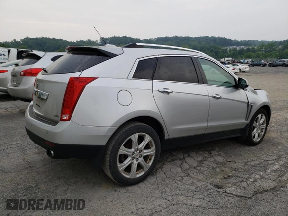 2015 Cadillac SRX Performance Collection with VIN 3GYFNFE36FS549358, listed as a Copart auction lot 59724065 with 132,045 mi miles and Salvage title. Bid and sale history available at DreamBid. Image 3.