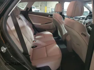 2018 Hyundai Tucson SEL z VIN KM8J3CA44JU690596, wystawiony jako Copart lot #60290475 z przebiegiem 97 512 mil mil oraz Szkoda całkowita • Salvage title. Historia ofert i sprzedaży dostępna na DreamBid. Obrazek 11.