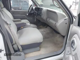 1999 Chevrolet Suburban with VIN 3GNEC16R2XG247140, listed as a IAAI auction lot 41761237 with 202,121 mi miles. Bid and sale history available at carsss.com. Image 5.