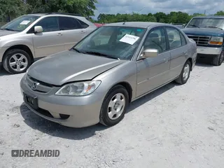 2004 Honda Civic Hybrid with VIN JHMES95644S021296, listed as a IAAI auction lot 42153296 with 281,563 mi miles. Bid and sale history available at carsss.com. Image 2.