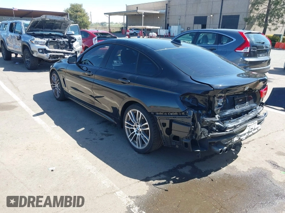 2015 BMW 4 Series 428i z VIN WBA4A9C52FGL86332, wystawiony jako IAAI lot #41970189 z przebiegiem 112 282 mil mil oraz . Historia ofert i sprzedaży dostępna na DreamBid. Obrazek 3.